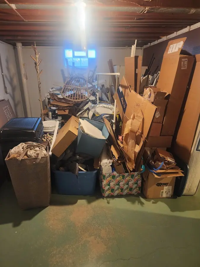 Roll-off dumpster container at job site for 2 Yard Dumpster Rental in Berne